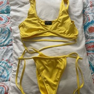 ICON Swim brand, string tie. Straps for the top. Very Cheeky bottom